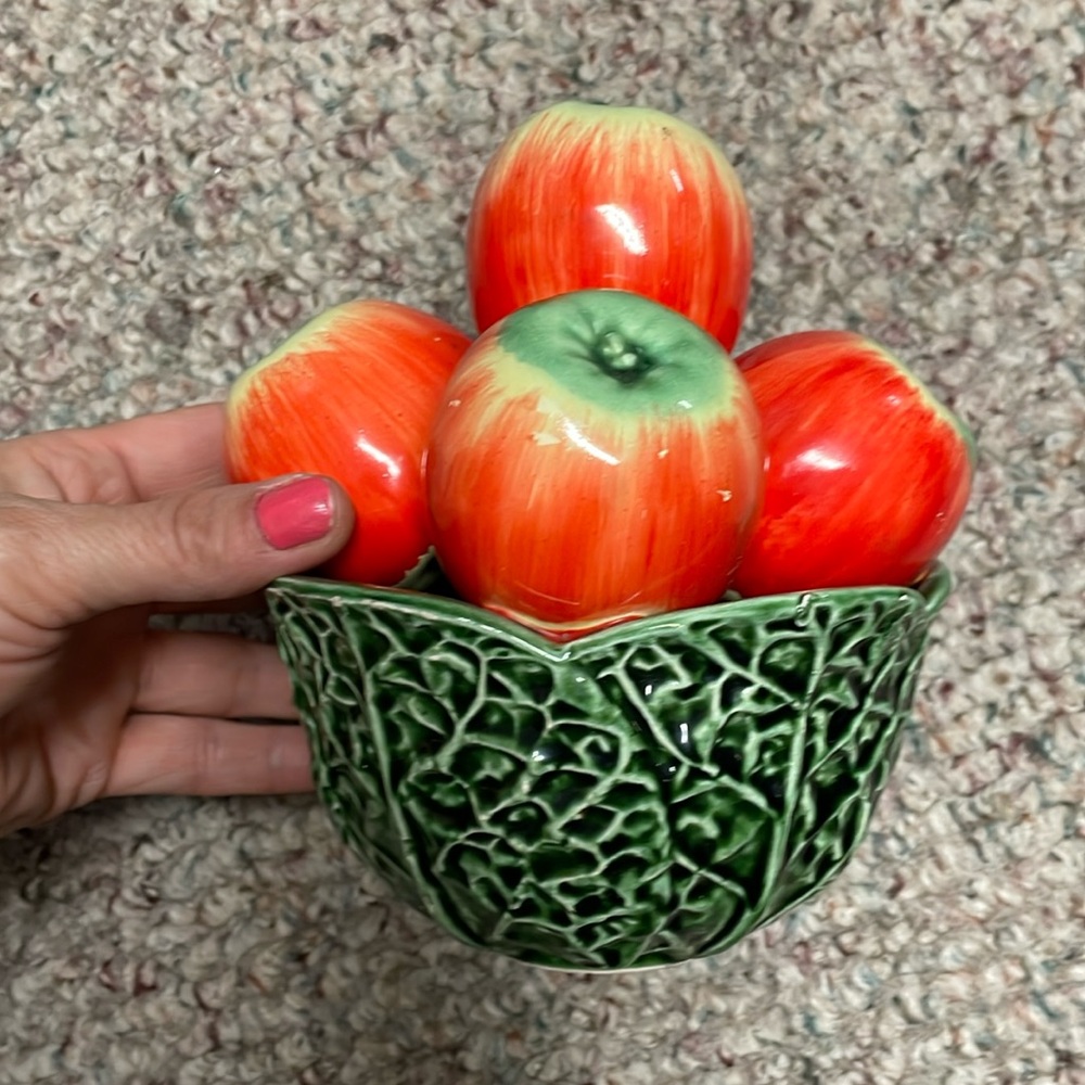 Vintage glass apple in cabbage leaf